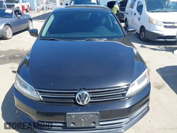 2015 Volkswagen Jetta Sedan 1.8T SE with VIN 3VWD17AJ6FM235908, listed as a IAAI auction lot 42015028 with 178,814 mi miles. Bid and sale history available at carsss.com. Image 6.