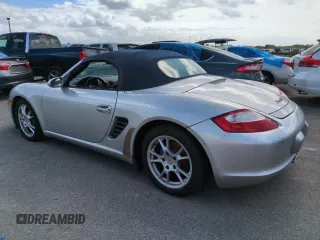2006 Porsche Boxster с VIN WP0CA29866U710780, выставлен на аукционе Copart как лот 74619804 с пробегом Не указан миль и На запчасти • Non repairable. История ставок и продаж доступна на DreamBid. Изображение 2.