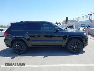 2017 Jeep Grand Cherokee 75th Anniversary with VIN 1C4RJEAG6HC956218, listed as a IAAI auction lot 42353950 with 113,398 mi miles and . Bid and sale history available at DreamBid. Image 14.