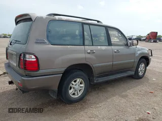 1999 Lexus LX 470 with VIN JT6HT00W8X0068157, listed as a IAAI auction lot 41955366 with 291,014 mi miles and . Bid and sale history available at DreamBid. Image 4.