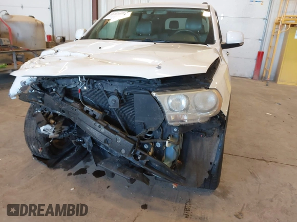 2013 Dodge Durango Crew with VIN 1C4RDHDG5DC553913, listed as a IAAI auction lot 42227189 with 209,703 mi miles and . Bid and sale history available at DreamBid. Image 6.