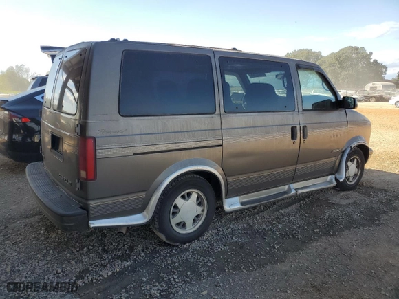1999 Chevrolet Astro Cargo Van YF7 with VIN 1GBDM19W2XB174951, listed as a Copart auction lot 76009344 with 131,554 mi miles and Salvage Title. Bid and sale history available at carsss.com. Image 3.