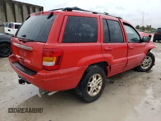 1999 Jeep Grand Cherokee Limited with VIN 1J4G268S8XC758964, listed as a Copart auction lot 71442794 with 321,284 mi miles and Non repairable. Bid and sale history available at DreamBid. Image 4.