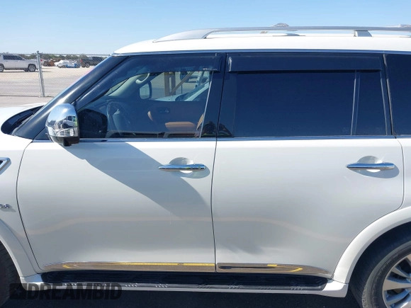 2016 Infiniti QX80 z VIN JN8AZ2NC2G9400211, wystawiony jako IAAI lot #41818944 z przebiegiem 108 206 mil mil oraz . Historia ofert i sprzedaży dostępna na DreamBid. Obrazek 14.