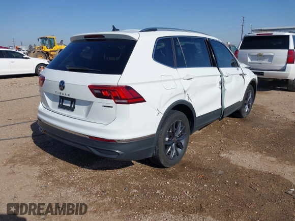 2022 Volkswagen Tiguan SE with VIN 3VV2B7AX2NM010932, listed as a IAAI auction lot 42007364 with 26,014 mi miles and . Bid and sale history available at DreamBid. Image 4.
