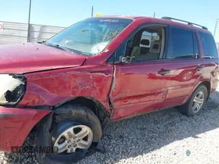 2005 Honda Pilot EX-L with VIN 5FNYF18505B022497, listed as a IAAI auction lot 41994385 with 199,143 mi miles. Bid and sale history available at carsss.com. Image 6.