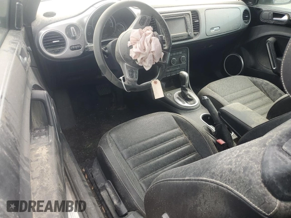 2014 Volkswagen Beetle 1.8T w/Premium z VIN 3VW517AT6EM816698, wystawiony jako Copart lot #57344055 z przebiegiem 52 782 mil mil oraz Szkoda całkowita • Salvage title. Historia ofert i sprzedaży dostępna na DreamBid. Obrazek 8.