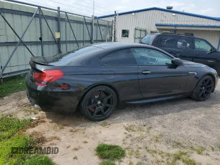 2014 BMW M6 z VIN WBSLX9C54ED160430, wystawiony jako Copart lot #66270794 z przebiegiem 92 025 mil mil oraz Szkoda całkowita • Salvage title. Historia ofert i sprzedaży dostępna na DreamBid. Obrazek 3.
