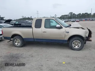 2000 Ford F-150 XL с VIN 1FTRX17L1YNA50543, выставлен на аукционе IAAI как лот 41864001 с пробегом 251 925 миль миль и . История ставок и продаж доступна на DreamBid. Изображение 13.