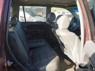 2007 Honda Pilot EX-L with VIN 5FNYF28777B009126, listed as a IAAI auction lot 41721741 with 227,614 mi miles. Bid and sale history available at carsss.com. Image 8.