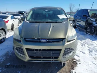 2013 Ford Escape SE with VIN 1FMCU0GX4DUC60741, listed as a IAAI auction lot 41592770 with 121,972 mi miles and . Bid and sale history available at DreamBid. Image 12.