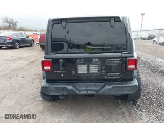 2019 Jeep Wrangler Unlimited Sport with VIN 1C4HJXDG7KW528649, listed as a IAAI auction lot 41029000 with 112,561 mi miles. Bid and sale history available at carsss.com. Image 4.