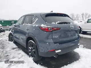 2024 Mazda CX-5 2.5 S Carbon Edition with VIN JM3KFBCL3R0421255, listed as a IAAI auction lot 41555197 with 4,134 mi miles. Bid and sale history available at carsss.com. Image 3.