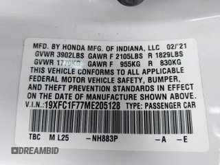 2021 Honda Civic Sedan EX-L with VIN 19XFC1F77ME205128, listed as a IAAI auction lot 41562202 with 82,257 mi miles. Bid and sale history available at carsss.com. Image 9.