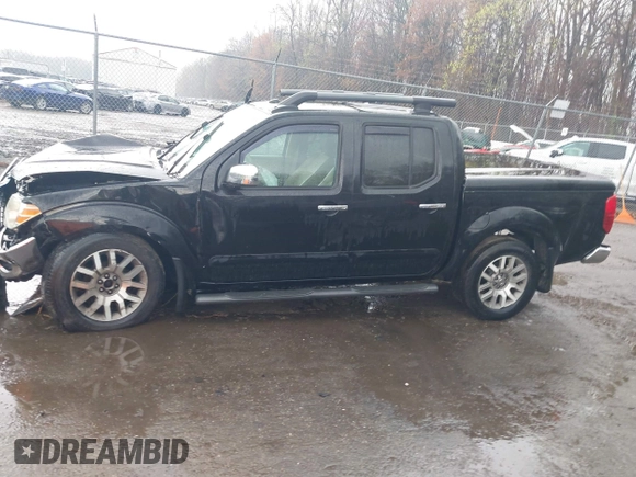 2011 Nissan Frontier Pro-4X with VIN 1N6AD0EV5BC440663, listed as a IAAI auction lot 41923918 with 168,331 mi miles and . Bid and sale history available at DreamBid. Image 14.