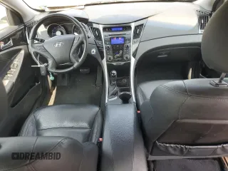 2012 Hyundai Sonata Limited z VIN 5NPEC4AB2CH490212, wystawiony jako Copart lot #59576655 z przebiegiem 144 183 mil mil oraz Szkoda całkowita • Salvage title. Historia ofert i sprzedaży dostępna na DreamBid. Obrazek 8.