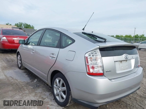 2007 Toyota Prius z VIN JTDKB20U173284944, wystawiony jako IAAI lot #42343170 z przebiegiem 172 776 mil mil oraz . Historia ofert i sprzedaży dostępna na DreamBid. Obrazek 3.