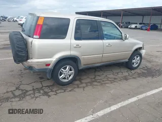 2001 Honda CR-V SE with VIN JHLRD18791C000245, listed as a IAAI auction lot 41910546 with 140,712 mi miles. Bid and sale history available at carsss.com. Image 4.