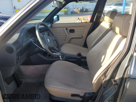 1989 BMW 3 Series 325i with VIN WBAAD2307K8849902, listed as a Copart auction lot 87257434 with 233,562 mi miles and Salvage Title. Bid and sale history available at carsss.com. Image 7.