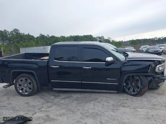 2017 GMC Sierra 1500 Denali with VIN 3GTU2PEJ5HG130000, listed as a IAAI auction lot 41232801 with 104,875 mi miles. Bid and sale history available at carsss.com. Image 13.