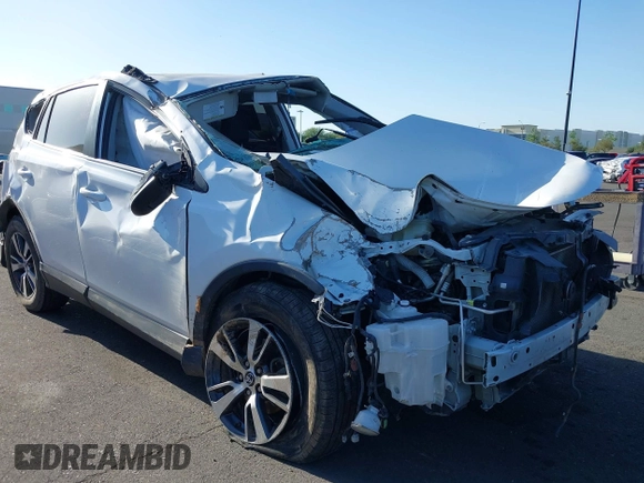 2018 Toyota RAV4 XLE with VIN 2T3WFREV3JW484955, listed as a IAAI auction lot 42262089 with 118,527 mi miles and . Bid and sale history available at DreamBid. Image 1.