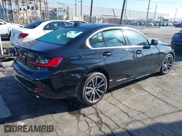 2021 BMW 3 Series 330i with VIN 3MW5R1J00M8B85692, listed as a IAAI auction lot 41824283 with 21,040 mi miles. Bid and sale history available at carsss.com. Image 4.