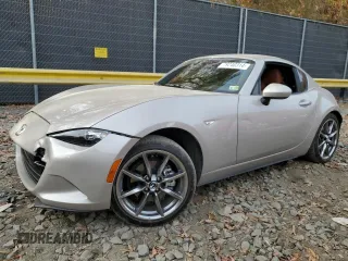2023 Mazda MX-5 Miata Grand Touring z VIN JM1NDAM70P0552860, wystawiony jako Copart lot #79240314 z przebiegiem 16 173 mil mil oraz Szkoda całkowita • Salvage title. Historia ofert i sprzedaży dostępna na DreamBid. Obrazek 1.