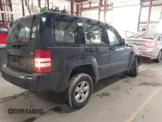 2012 Jeep Liberty Sport z VIN 1C4PJMAK9CW158308, wystawiony jako IAAI lot #41665502 z przebiegiem 125 595 mil mil oraz . Historia ofert i sprzedaży dostępna na DreamBid. Obrazek 4.