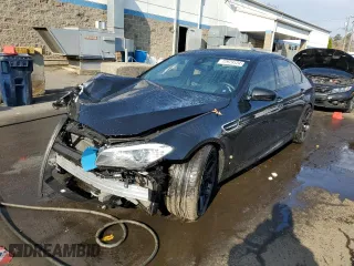 2013 BMW M5 with VIN WBSFV9C54DC772750, listed as a Copart auction lot 77979124 with 0 mi miles and Salvage Title. Bid and sale history available at carsss.com. Image 1.