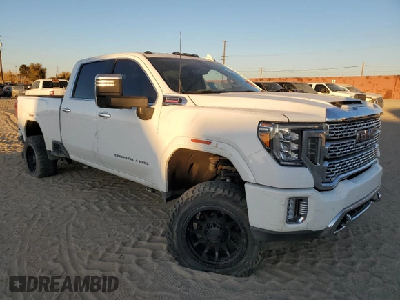 2021 GMC Sierra 3500HD Denali z VIN 1GT49WEYXMF156221, wystawiony jako Copart lot #81958804 z przebiegiem 60 986 mil mil oraz Nie do naprawy • Non repairable. Historia ofert i sprzedaży dostępna na DreamBid. Obrazek 4.
