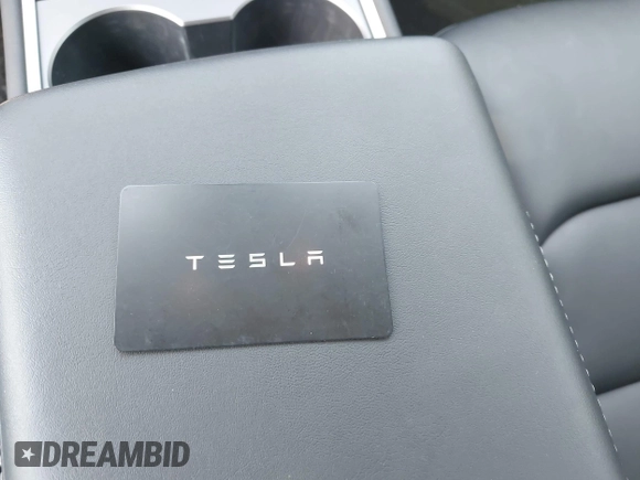 2023 Tesla Model 3 with VIN 5YJ3E1EA2PF566047, listed as a IAAI auction lot 42481008 with 21,143 mi miles and . Bid and sale history available at DreamBid. Image 11.