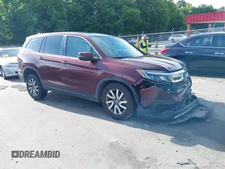 2021 Honda Pilot EX-L with VIN 5FNYF5H55MB032982, listed as a IAAI auction lot 42511656 with 104,018 mi miles and . Bid and sale history available at DreamBid. Image 1.