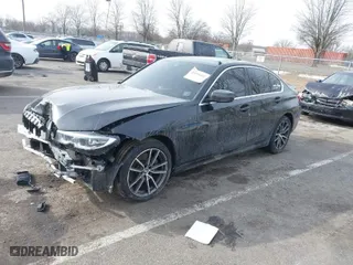 2021 BMW 3 Series 330i xDrive with VIN 3MW5R7J04M8B59583, listed as a IAAI auction lot 41308402 with 45,930 mi miles. Bid and sale history available at carsss.com. Image 2.