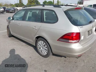 2013 Volkswagen Jetta SportWagen S with VIN 3VWPP7AJ9DM643540, listed as a IAAI auction lot 41911740 with 124,914 mi miles. Bid and sale history available at carsss.com. Image 3.