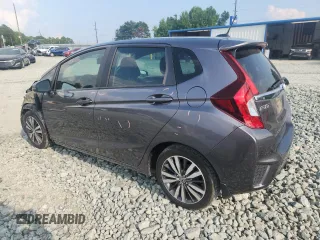 2015 Honda Fit EX-L with VIN 3HGGK5H87FM708737, listed as a Copart auction lot 64310745 with 90,446 mi miles and Salvage title. Bid and sale history available at DreamBid. Image 2.