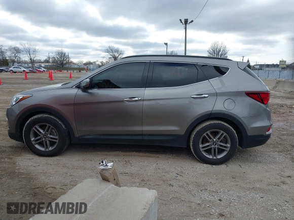 2017 Hyundai Santa Fe 2.4L with VIN 5XYZU3LB4HG424734, listed as a IAAI auction lot 41491166 with 130,905 mi miles and . Bid and sale history available at DreamBid. Image 14.