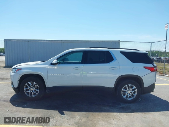2019 Chevrolet Traverse LT z VIN 1GNERHKW2KJ305953, wystawiony jako IAAI lot #42064913 z przebiegiem 104 200 mil mil oraz . Historia ofert i sprzedaży dostępna na DreamBid. Obrazek 14.