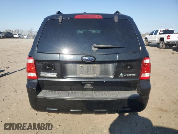 2010 Ford Escape Hybrid z VIN 1FMCU4K31AKA00915, wystawiony jako Copart lot #43911725 z przebiegiem 92 763 mil mil oraz Szkoda całkowita • Salvage title. Historia ofert i sprzedaży dostępna na DreamBid. Obrazek 6.