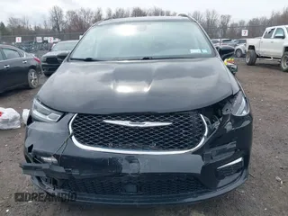 2022 Chrysler Pacifica Touring L with VIN 2C4RC1BG2NR117879, listed as a IAAI auction lot 41845778 with 96,523 mi miles and . Bid and sale history available at DreamBid. Image 12.