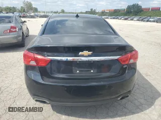 2014 Chevrolet Impala LTZ with VIN 1G1155S38EU169167, listed as a Copart auction lot 73174254 with 156,884 mi miles and Salvage Title. Bid and sale history available at DreamBid. Image 6.