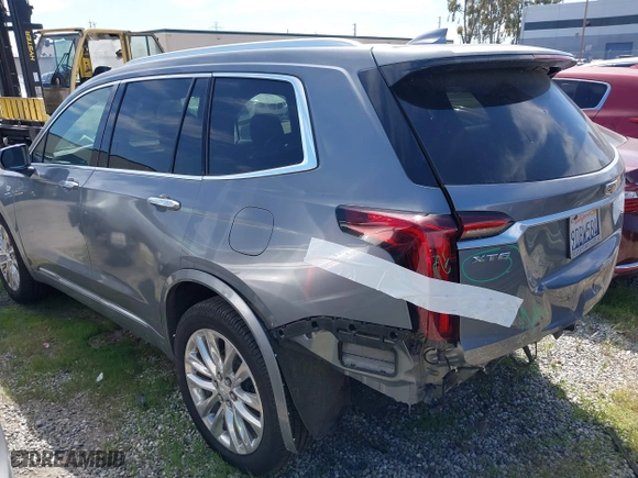 2020 Cadillac XT6 FWD Premium Luxury with VIN 1GYKPCRSXLZ105231, listed as a IAAI auction lot 41735556 with 70,319 mi miles. Bid and sale history available at carsss.com. Image 3.