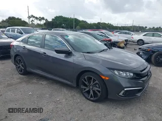 2019 Honda Civic Sedan Sport with VIN 2HGFC2F89KH563333, listed as a IAAI auction lot 41959217 with 66,068 mi miles. Bid and sale history available at carsss.com. Image 1.