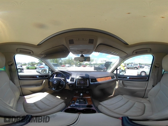 2012 Volkswagen Touareg Sport with VIN WVGEF9BP1CD008717, listed as a IAAI auction lot 42120641 with 211,580 mi miles and . Bid and sale history available at DreamBid. Image 18.
