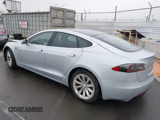 2016 Tesla Model S 70 with VIN 5YJSA1E17GF156514, listed as a IAAI auction lot 41869006 with 17,704 mi miles and . Bid and sale history available at DreamBid. Image 3.
