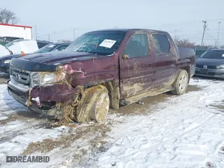 2011 Honda Ridgeline RTL with VIN 5FPYK1F58BB004573, listed as a IAAI auction lot 41576676 with 56,120 mi miles. Bid and sale history available at carsss.com. Image 2.