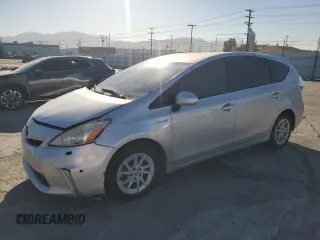 2014 Toyota Prius Two z VIN JTDZN3EU3E3297373, wystawiony jako Copart lot #63705855 z przebiegiem 128 957 mil mil oraz Szkoda całkowita • Salvage title. Historia ofert i sprzedaży dostępna na DreamBid. Obrazek 1.
