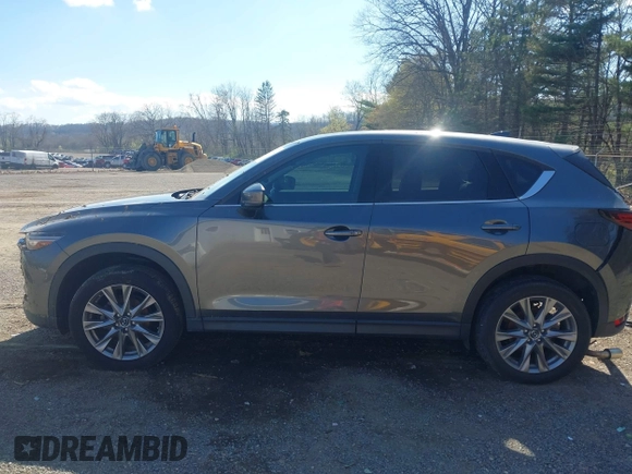 2020 Mazda CX-5 Grand Touring with VIN JM3KFBDM1L0821975, listed as a IAAI auction lot 40088794 with 68,895 mi miles and . Bid and sale history available at DreamBid. Image 15.