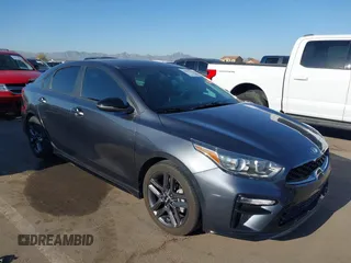 2021 Kia Forte GT-Line with VIN 3KPF34AD9ME329982, listed as a IAAI auction lot 41974225 with 65,197 mi miles. Bid and sale history available at carsss.com. Image 1.