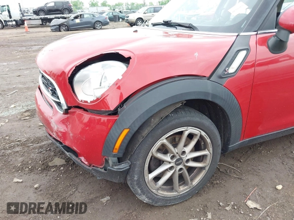 2015 MINI Countryman S with VIN WMWZC3C56FWP53249, listed as a IAAI auction lot 42256130 with 104,415 mi miles and . Bid and sale history available at DreamBid. Image 6.
