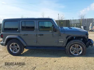 2018 Jeep Wrangler Unlimited Sahara with VIN 1C4HJXEN9JW303094, listed as a IAAI auction lot 41491564 with 66,128 mi miles and . Bid and sale history available at DreamBid. Image 13.